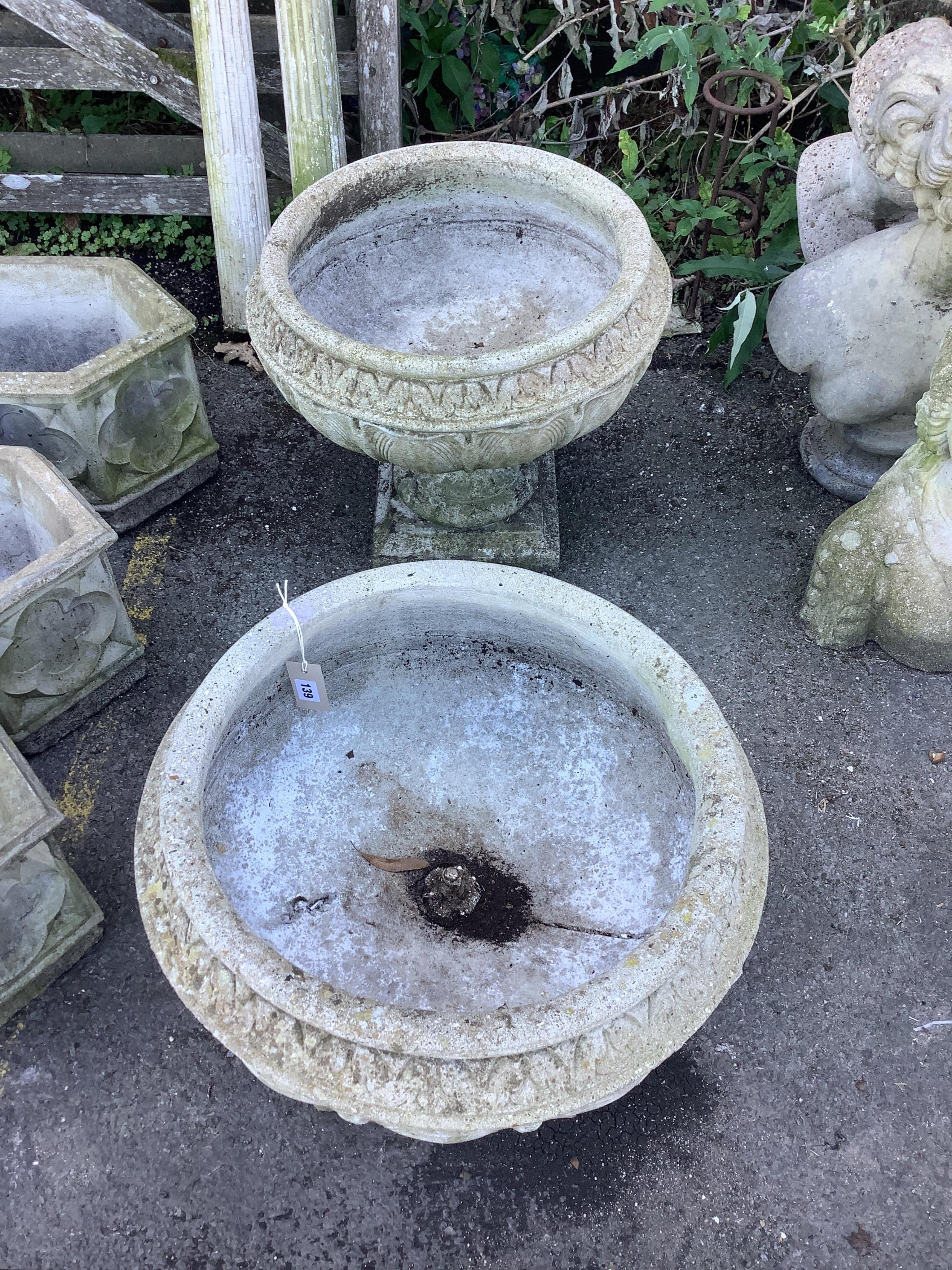 A pair of circular reconstituted stone garden planters, diameter 54cm, height 46cm. Condition - poor to fair